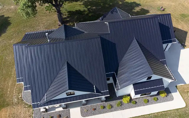 Example photo: House roof covered in standing-seam metal panels